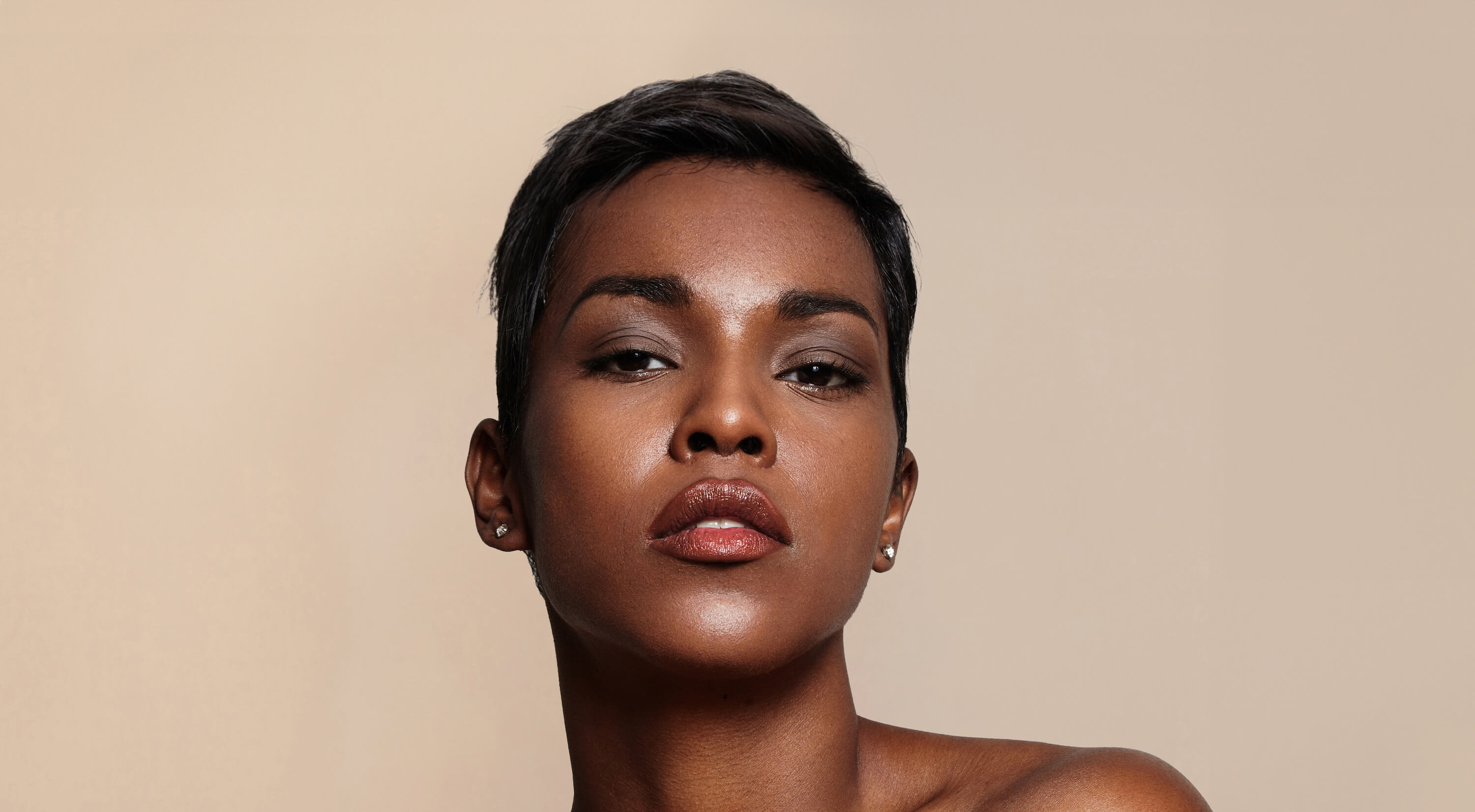 Photo of a beautiful female model with great skin and short hair