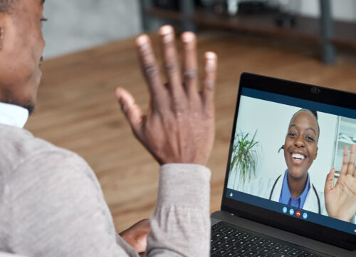 Photo of a man using telehealth services